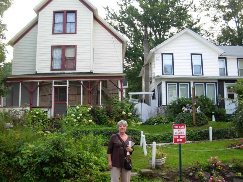 The homes were in different states of repair.  Some were newly restored and others needing some repair to very thorough remodel.  The ones behind Louise are in pretty good shape.  Notice how nice the gardens are.