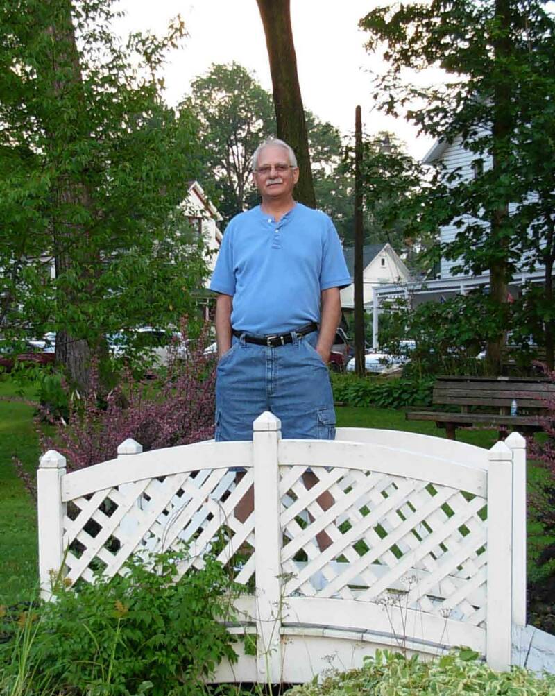 This bridge is actually in the park to the left.  If you look over the bench in the park picture you can see the bridge.  The guy on the bridge wouldn't get off so consider him part of the scenery.