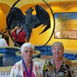 ANN & LOUISE POSING IN FROM OF THE FAMOUS BACARDI BAT.  SUPPOSEDLY THE BAT BROUGHT GOOD LUCK TO THE ENTERPRISE.